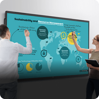 A man and a woman both annotating on the Createboard at the same time.